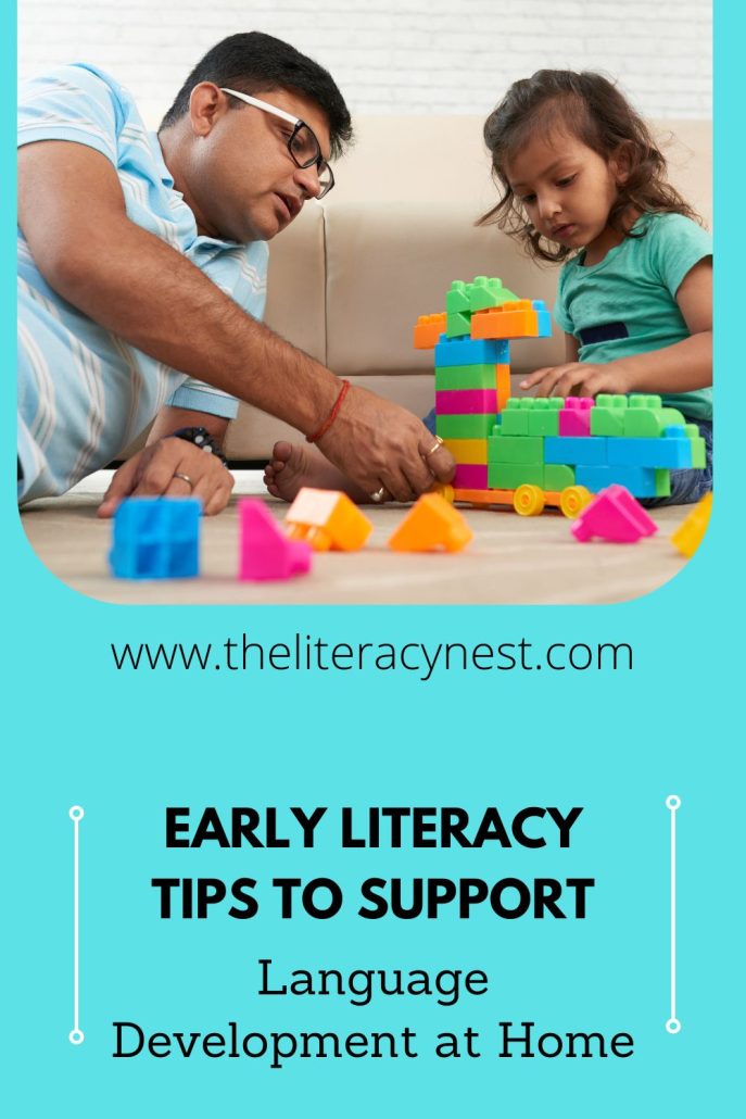 This is the pinnable image for a blog post about Early Literacy Tips to Support Language Development at Home. On the bottom there is the title of the blog post, on the top a father and a daughter sit on the floor and play with colorful blocks.